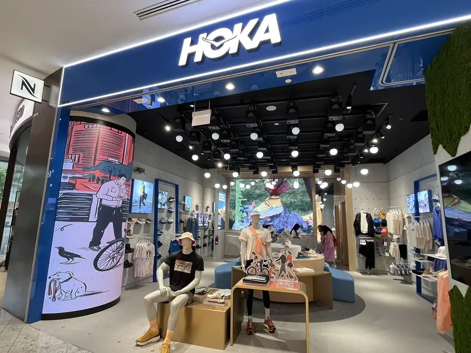 HOKA Store — Flexible & Curved by ETA Visual in Raffles City, Singapore