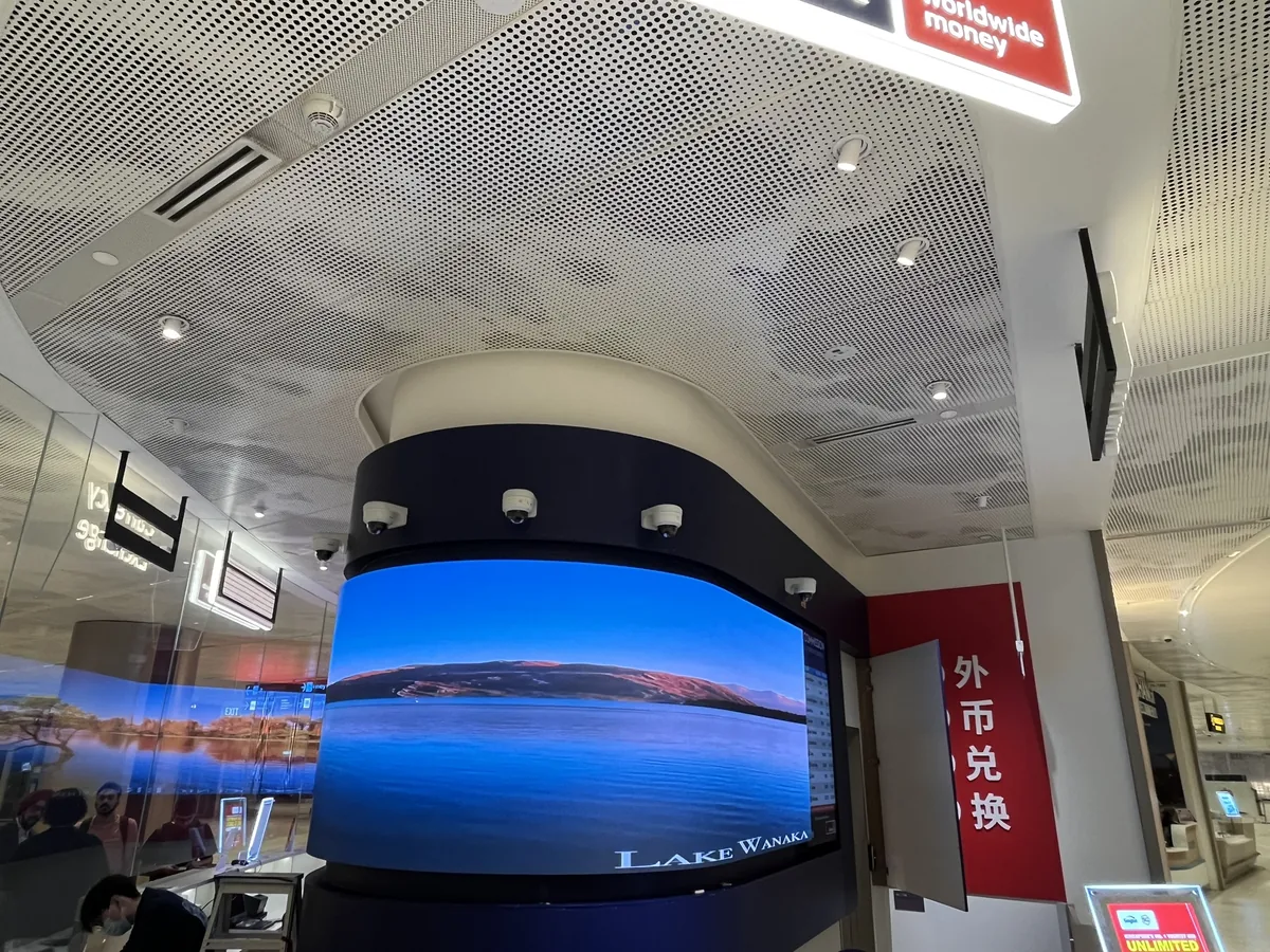 Travelex Currency Exchange — view 3 — Flexible & Curved installation by ETA Visual