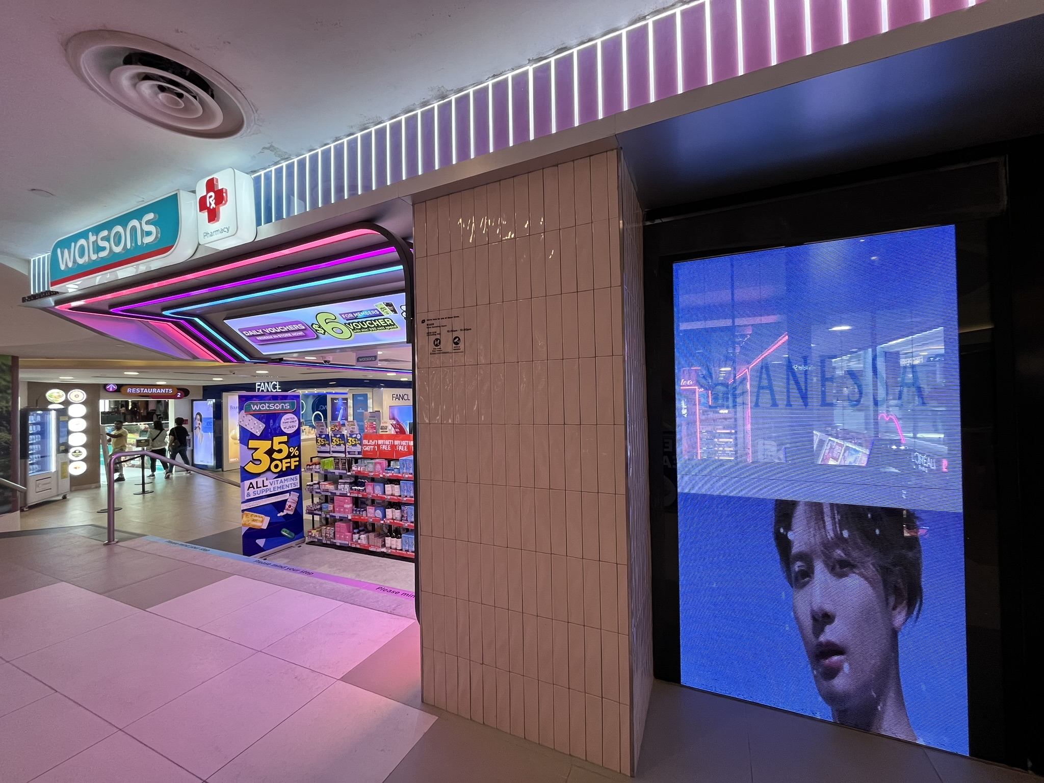 Watsons Transparent Shopfront — Transparent LED by ETA Visual in Bugis Junction, Singapore